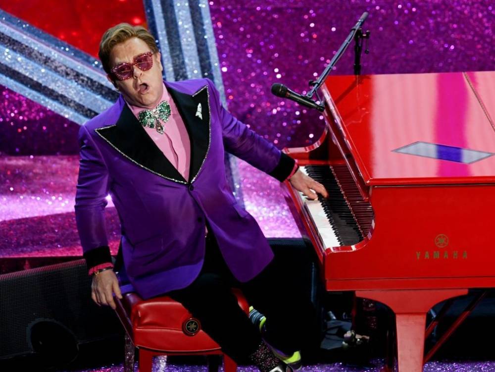 Elton John - David Furnish - Elton John lays off band after losing US$75 million due to cancelled tour - torontosun.com - Usa - Georgia - city Atlanta, Georgia