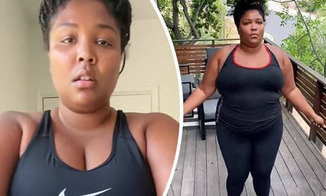 Lizzo says she's been working out for years and tells body shamers to mind their 'f***ing business' - dailymail.co.uk