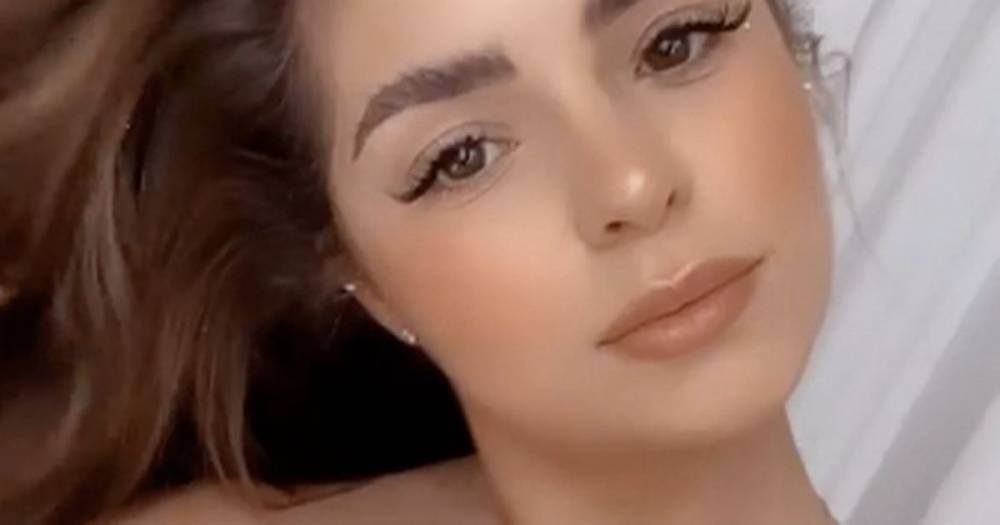 Demi Rose's boobs spill out of tiny towel held up by luck alone in eye-popping snap - dailystar.co.uk