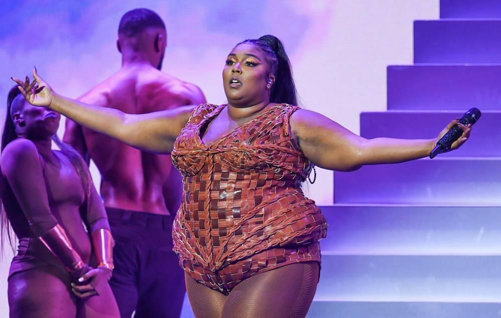 Lizzo addresses fat-shamers in new TikTok exercise video: “I’m not working out to have your ideal body type” - nme.com