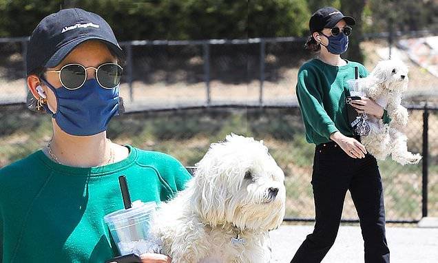 Eric Garcetti - Lucy Hale - Lucy Hale sports Alone Together charity cap while carrying dog Elvis... after attending BLM protest - dailymail.co.uk - Los Angeles - city Los Angeles