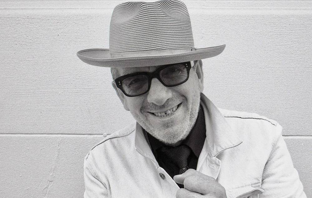 Elvis Costello - Elvis Costello returns with new protest song ‘No Flag’ - nme.com - Finland - city Helsinki, Finland
