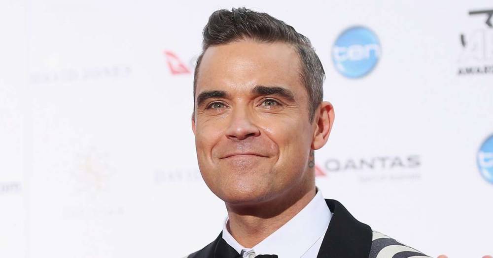 Robbie Williams - Robbie Williams debuts DIY hair transformation – but worried fans point out a mistake - msn.com - Los Angeles