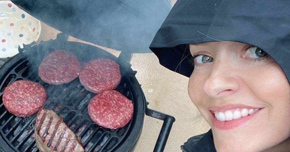 Holly Willoughby - Holly Willoughby has 'classic British BBQ' in the rain as she covers up in mac - mirror.co.uk - Britain