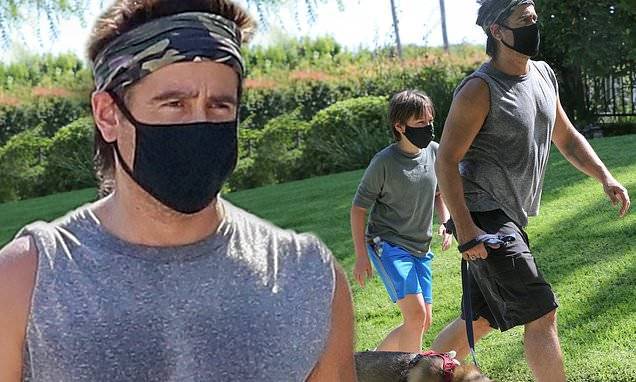 Colin Farrell - Colin Farrell works up a sweat during a dog walk with son Henry in Los Angeles - dailymail.co.uk - Ireland - city Los Angeles - county Henry