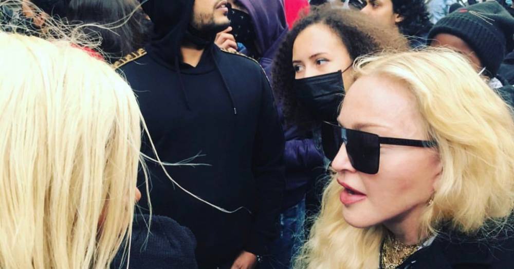 Madonna praised by fans as she’s spotted marching in crutches at Black Lives Matter protest in London - ok.co.uk - city London