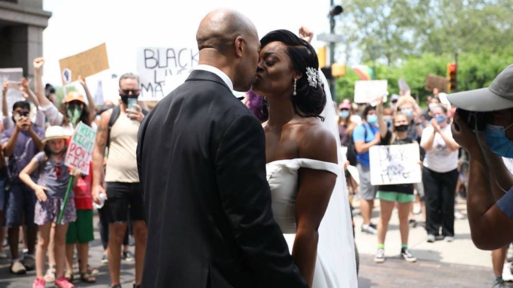 Good News - George Floyd - Couple Gets Married, Joins Philadelphia Protesters in Moving Moment: Watch - etonline.com - state Pennsylvania - Philadelphia, state Pennsylvania