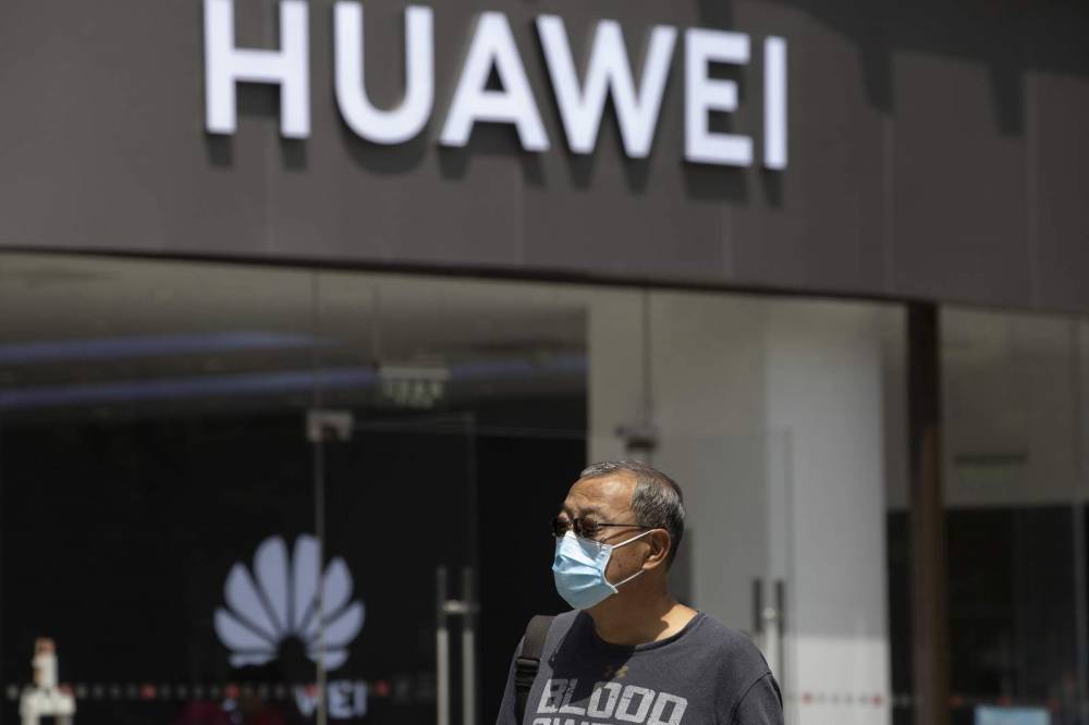 China's Huawei launches ad blitz as UK reconsiders its role - clickorlando.com - China - city Beijing - Britain