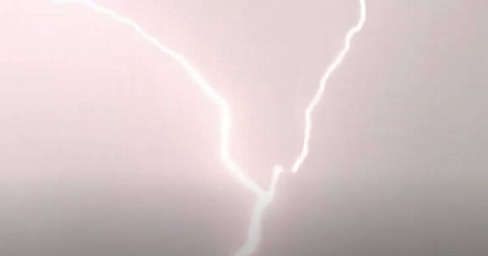 Shocking moment plane flying over London gets struck by lightning three times - mirror.co.uk
