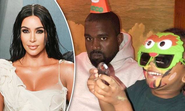 Kim Kardashian - Kanye West - Kim Kardashian posts sweet snaps of her stoic-looking husband Kanye West wearing a party hat - dailymail.co.uk