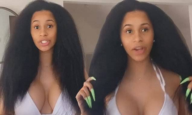 Cardi B embraces her natural 'hair texture' on Instagram: 'This is really how my hair is' - dailymail.co.uk