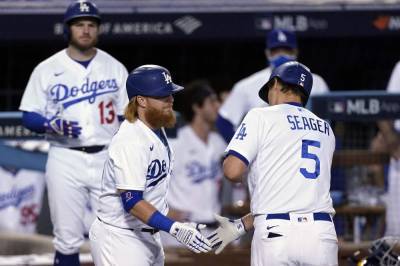 Will Smith - Corey Seager - Seager homers, Dodgers edge Brewers 4-2 in wild-card opener - clickorlando.com - Los Angeles - city Los Angeles - city Milwaukee