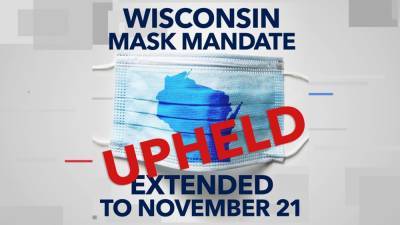 Tony Evers - Wisconsin judge upholds mask order for enclosed spaces - fox29.com - Madison, state Wisconsin - state Wisconsin