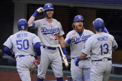Edwin Ríos - Max Muncy - 11-spot: Dodgers huge 1st in 15-3 win over Braves in NLCS - clickorlando.com - Los Angeles - city Atlanta - state Texas - county Arlington