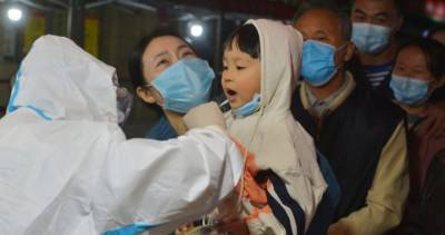 China fires 2 health officials after new coronavirus outbreak in northern city - globalnews.ca - China