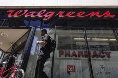 Drugstore chain Walgreens rebounds with $373M 4Q profit - clickorlando.com - Britain