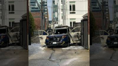 Man arrested after Seattle Police car set on fire with officer inside - fox29.com - city Seattle