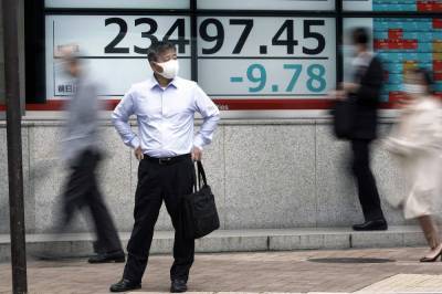 Asian shares mixed amid 2nd wave coronavirus, election fears - clickorlando.com - China - South Korea - Japan - Hong Kong - Australia - city Tokyo - city Shanghai