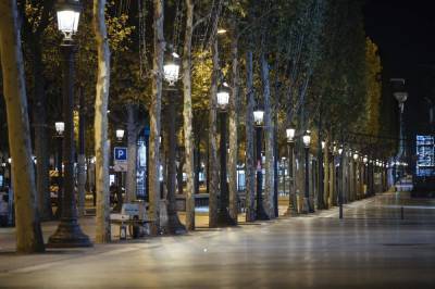 Emmanuel Macron - French virus curfew produces eerie quiet on streets of Paris - clickorlando.com - France