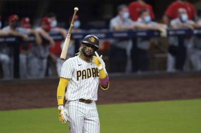 Lou Gehrig - Manny Machado - Fernando Tatis-Junior - Wil Myers - Tatis, Myers homer twice, Padres stay alive with 11-9 win - clickorlando.com - New York - county San Diego - county St. Louis