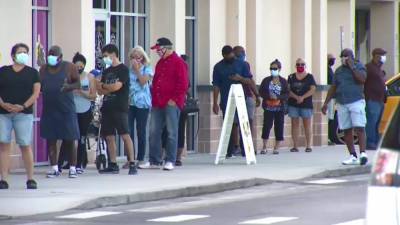 Early voters wait in long lines to cast their ballot in Orange County - clickorlando.com - state Florida - county Orange
