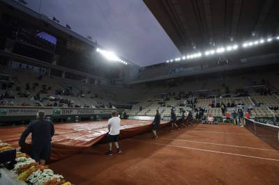 Roland Garros - The Latest: Two more COVID positives at Roland Garros - clickorlando.com - France