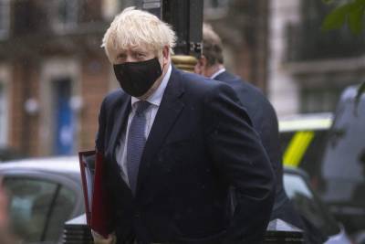 Boris Johnson - UK’s Johnson defends virus strategy as infections soar - clickorlando.com - Britain - county Johnson