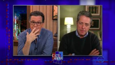 Stephen Colbert - Hugh Grant - Hugh Grant Shares He Suffered From COVID-19 in the Winter, Comically Details Quarantine Barbie Obsession - etonline.com