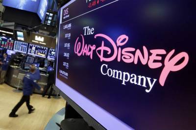 Disney posts 4Q loss as parks business, costs drag results - clickorlando.com