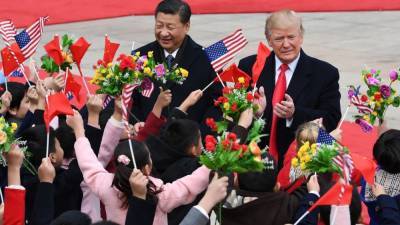Xi Jinping - Donald Trump - Trump to ban Americans from investing in Chinese companies - fox29.com - China - Usa - Washington - city Beijing, China