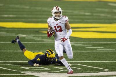 No. 13 Wisconsin routs Michigan 49-11 in 1st game in 3 weeks - clickorlando.com - state Michigan - state Wisconsin