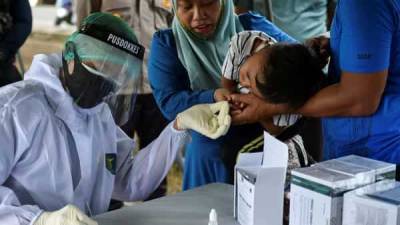 Indonesia plans massive covid-19 vaccination program next month - livemint.com - Indonesia