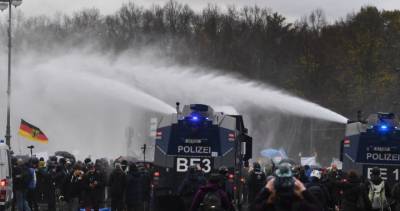 Angela Merkel - Police fire water cannons at demonstrators protesting coronavirus restrictions in Berlin - globalnews.ca - Germany - city Berlin