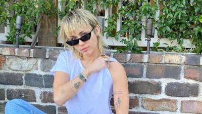 Miley Cyrus - Zane Lowe - Miley Cyrus Reveals the Coronavirus Pandemic Threatened Her Sobriety - etonline.com