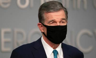 North Carolina Democratic governor issues new coronavirus rule: Wear a mask at home if you have guests over - foxnews.com - state North Carolina