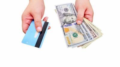 Absent new stimulus, wealthy pay off credit cards, while others dive deeper into debt - fox29.com