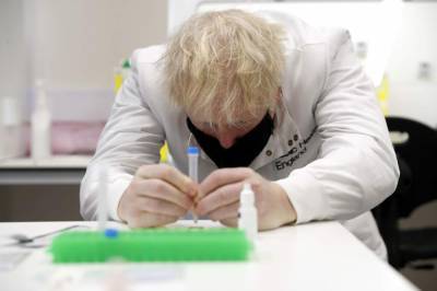 Boris Johnson - UK appoints vaccines minister to oversee COVID inoculations - clickorlando.com - Britain