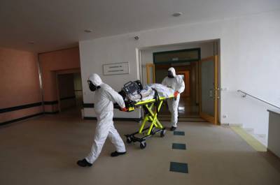 Short of medics as virus surges, central Europe sounds alarm - clickorlando.com - Usa - Poland - Czech Republic