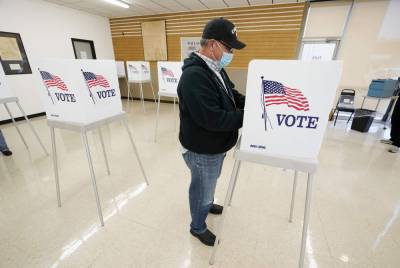 Polling places are latest front in battle over face masks - clickorlando.com - state Wisconsin