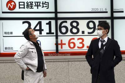 Asian stocks mixed after Wall Street election gains - clickorlando.com - city Beijing - city Tokyo - city Seoul - city Shanghai - city Hong Kong