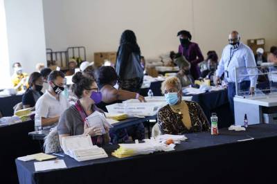 Georgia poll worker in hiding after false claims online - clickorlando.com - city Atlanta - Georgia - county Fulton