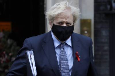 Boris Johnson - UK leader touts local virus rules but pubs are in distress - clickorlando.com - Britain