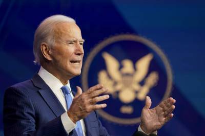 Joe Biden - The Latest: Biden urges public to have confidence in vaccine - clickorlando.com - Usa - Washington - city Wilmington