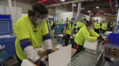 Coronavirus: Pfizer workers cheer as first COVID-19 vaccines are shipped from U.S. facility - globalnews.ca - Usa - state Michigan - county Kalamazoo
