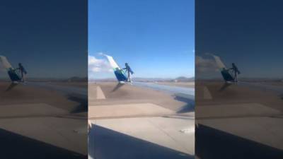 Man climbs onto commercial jet wing at Las Vegas airport, falls and gets arrested, videos show - fox29.com - city Las Vegas - state Nevada - state Alaska - county Henderson