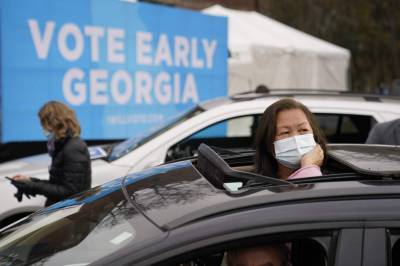 Facebook pauses political ad ban for Georgia runoffs - clickorlando.com - Georgia - county Early