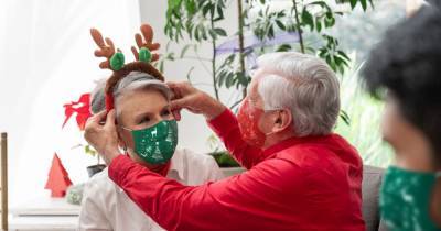 'Wear face masks during Christmas with family', World Health Organisation warns - dailystar.co.uk - Britain