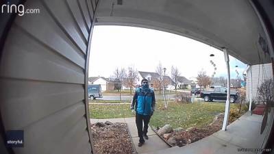 Video captures delivery driver stopping to salute home of Air National Guard member - fox29.com - city Detroit - state Michigan