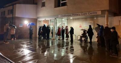 Coronavirus vaccine chaos as elderly turn up early and left queuing outside in the cold - mirror.co.uk - county Centre