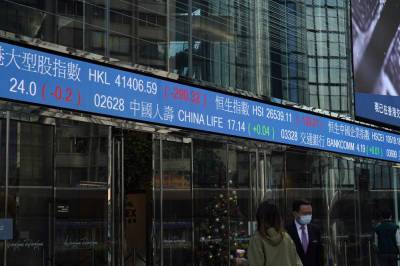 Asian stocks mixed after Wall St record on stimulus hope - clickorlando.com - city Beijing - city Tokyo - city Shanghai - city Hong Kong